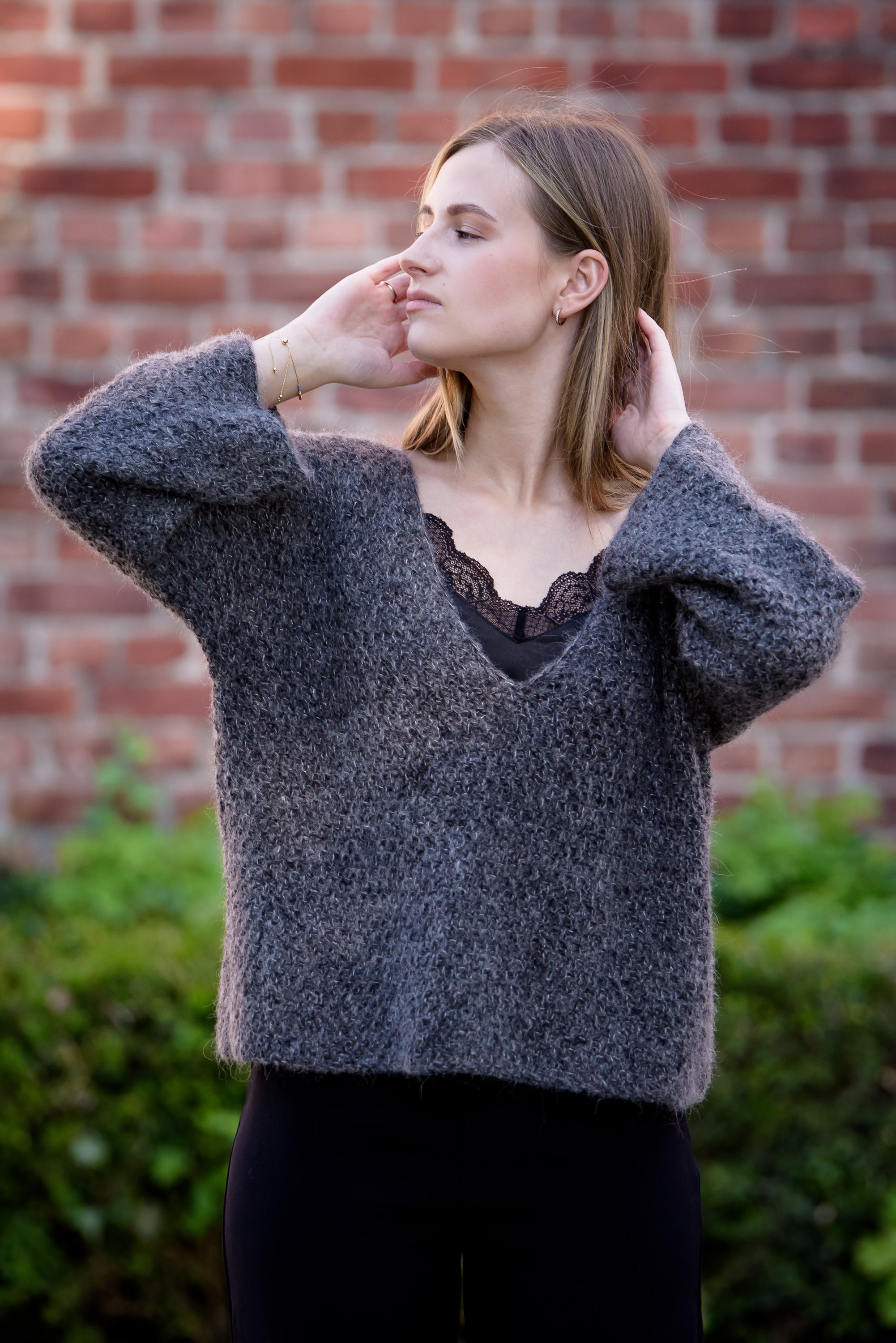 Pilkas moteriškas alpakų vilnos megztinis